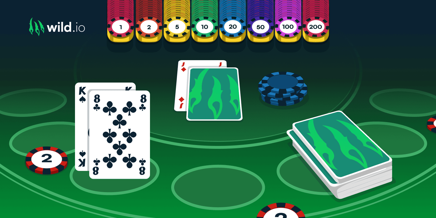 Spanish 21 blackjack table with cards and chips in gameplay